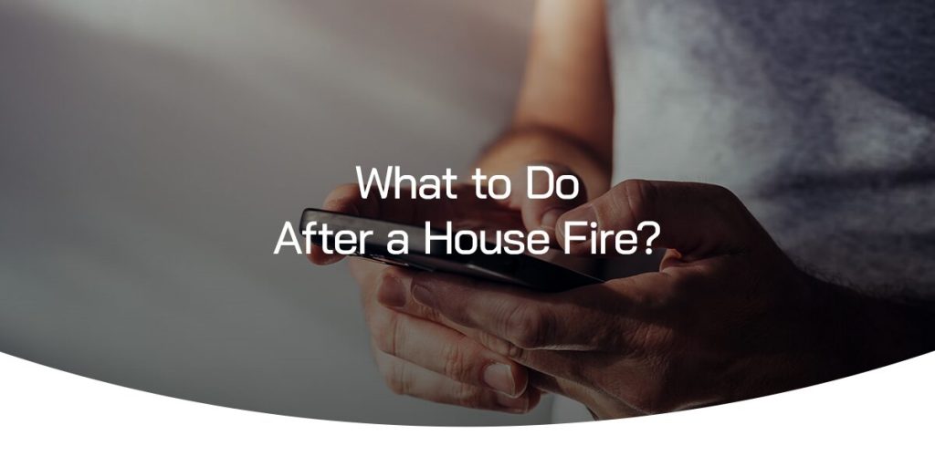 person holding a cell phone typing a text message